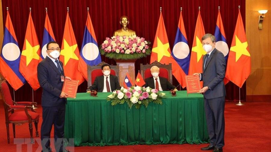 Tập đoàn XXX Việt Nam trao đổi các hợp đồng mua bán điện với các chủ đầu tư nhà máy thủy điện tại Lào Tập đoàn XXX Việt Nam trao đổi các hợp đồng mua bán điện với các chủ đầu tư nhà máy thủy điện tại Lào